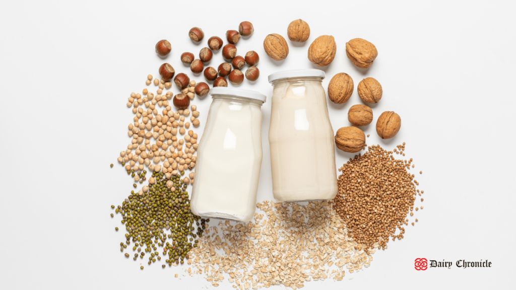 Two bottles of plant-based milk with dry fruits, promoting health, environmental benefits, and animal welfare.