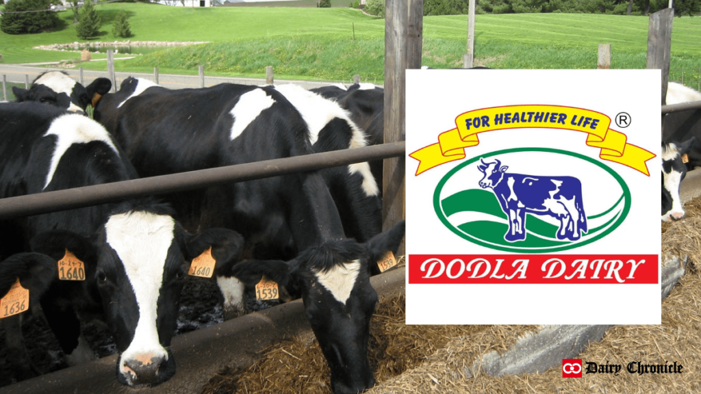 Dodla Dairy Logo with Cows in Barn Reflecting Strong Financial Growth