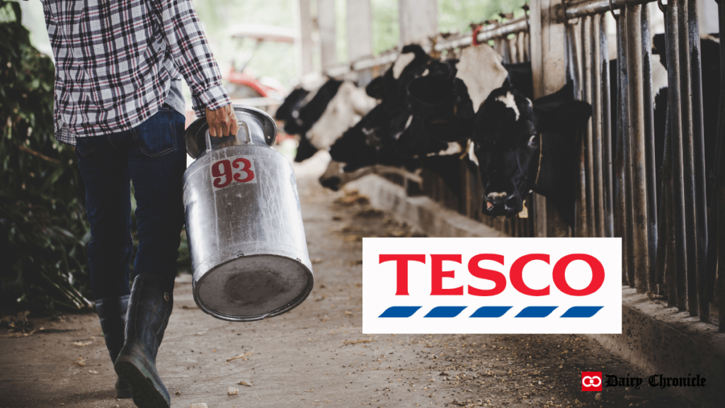 Tesco logo with a background of a farmer's hand milking a cow.