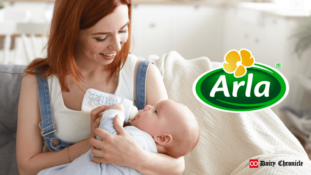 A woman feeding milk to her child using a milk bottle, with the Arla Foods logo beside her.