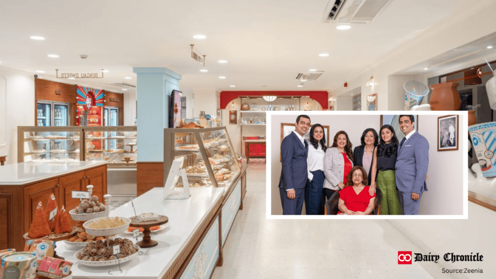 a group of people standing in a bakery