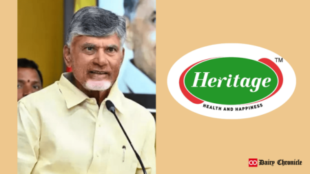 Picture of N Chandrababu Naidu beside the logo of Heritage Foods