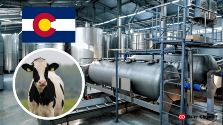 Bulk-tank milk testing in a laboratory with a cow and Colorado's flag in the background