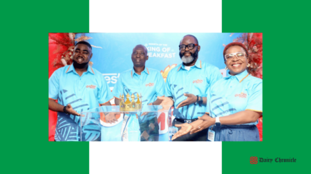 Three men and one woman presenting a crown, highlighting Nestlé Nigeria’s new eco-friendly packaging for Golden Morn