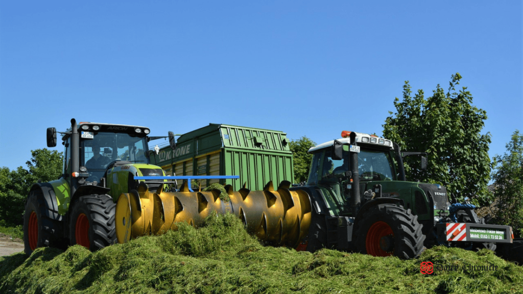 Two tractors cultivating silage, showcasing the step-by-step process of making silage