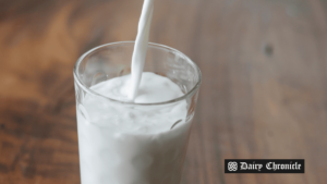 A glass of milk being poured, representing the surge in European cream prices due to holiday demand and milk shortages.