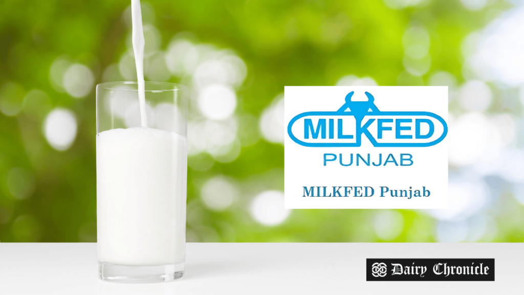 Milk pouring into a glass with a Milkfed Punjab logo in the background.