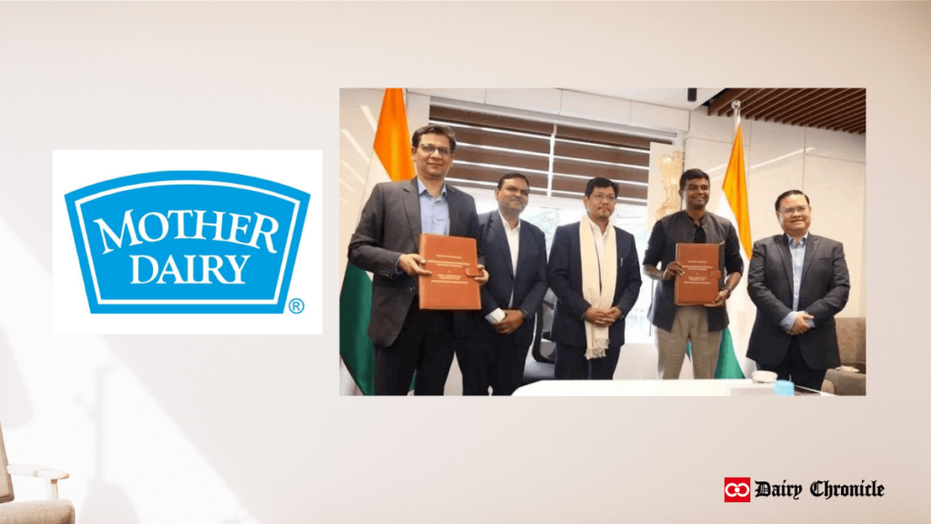 Mother Dairy logo beside a group of people holding Memorandum of Understanding (MoU) documents, symbolizing a new partnership