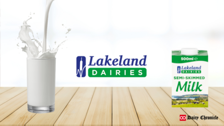 A glass of milk and a 500ml milk pouch featuring the Lakeland Dairies logo, representing the company's latest price adjustments