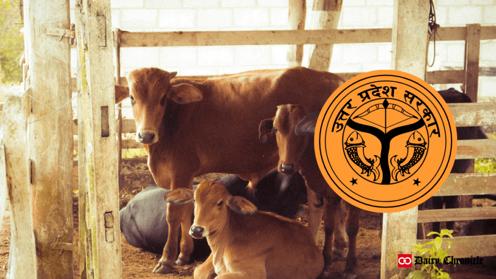 Barn with three cows and Uttar Pradesh government logo, highlighting the Nandini Farmers Prosperity Scheme.