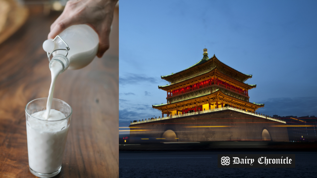 Milk pouring into a glass with a Chinese structured building in the background, highlighting the impact of China's milk powder ban.