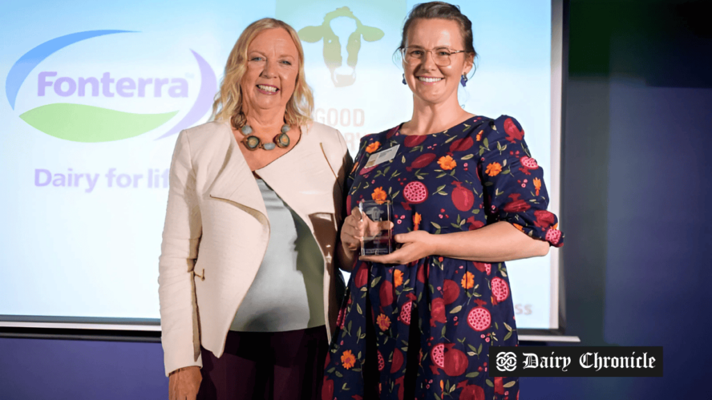 Fonterra's director receiving the global animal welfare award, recognizing the company's commitment to animal welfare standards.