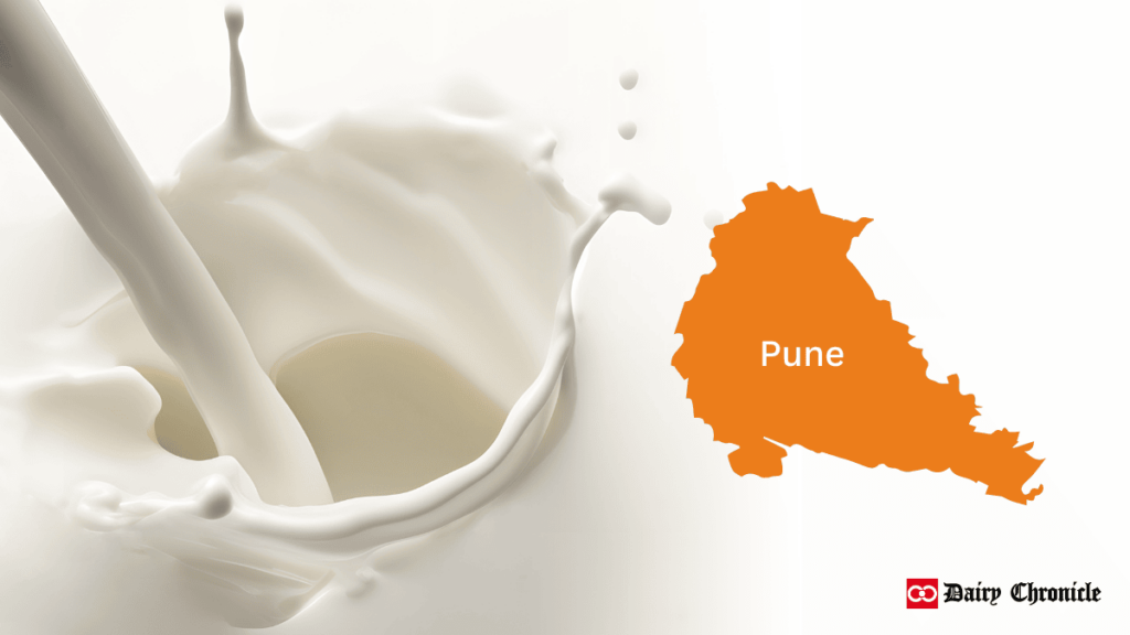 A stream of milk being poured, with a map of Pune city beside it.